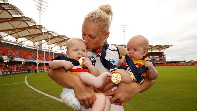 Phillips with her twins Blake and Brooklyn after winning the 2017 AFLW Grand Final. Picture: AFL Media