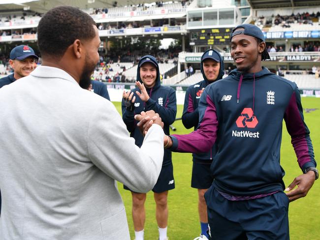 Jofra Archer of England is presented his test cap by Chris Jordan ahead of day one of the Ashes Test match at Lord's Cricket Ground. Picture: Gareth Copley/Getty Images