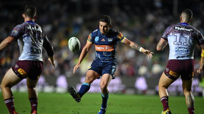 Ash Taylor puts in a kick during Gold Coast’s Round 11 win over Manly. Picture: AAP Image