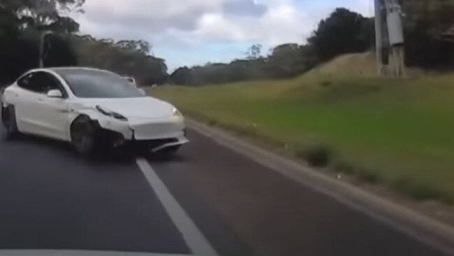 Dashcam footage captures the moment an out of control Tesla nearly hit multiple cars on the South Eastern Freeway. Picture: 7NEWS