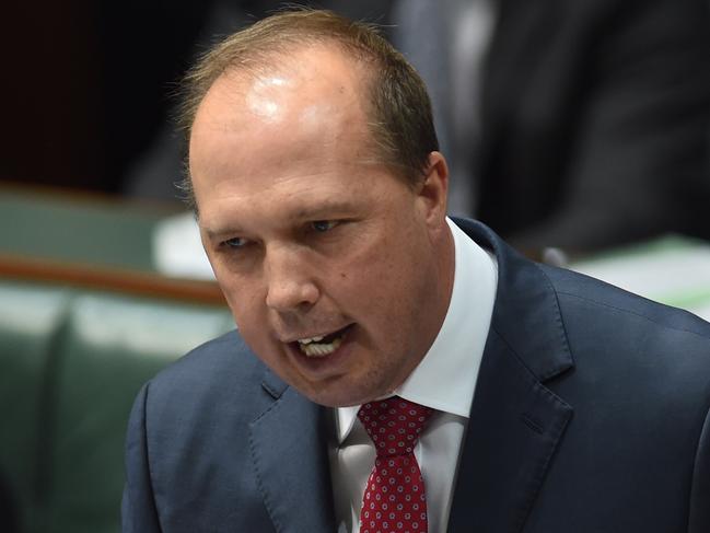 Australia's Immigration Minister Peter Dutton speaks during House of Representatives Question Time at Parliament House in Canberra, Monday, Nov. 28, 2016. (AAP Image/Lukas Coch) NO ARCHIVING