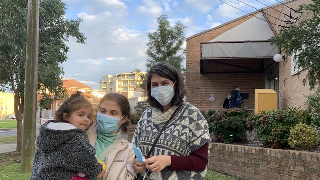 Nasim Jafari (right) with her mother and daughter after just getting tested for COVID-19 outside Pennant Hills Community Health Centre. Picture: Madelaine Wong