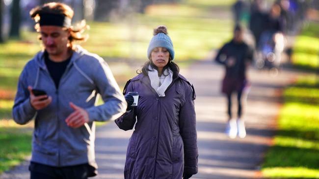 Melburnians have shivered through the coldest morning in two years. Picture: Luis Enrique Ascui