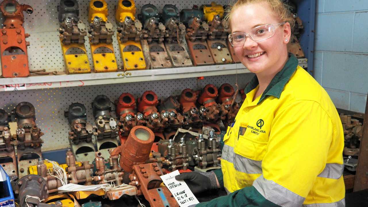 APPLICATIONS OPEN: Shianne Sprecher, third year electrical/instrumentation apprentice at Queensland Alumina Limited, checking level and pressure transmitters.