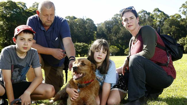 Patrick Haluza, Pavel Haluza, Olivia Haluza and Roslyn Bathgate with their dog Freddy support a plan to keep the park leash-free. Picture: John Appleyard