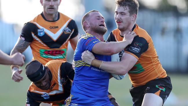 Kallin Adams crashed over for the matchwinner for Toukley. Picture: Sue Graham