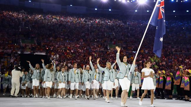 Anna Meares of Australia carries the flag during the Opening Ceremony of the Rio 2016 Olympic Games.