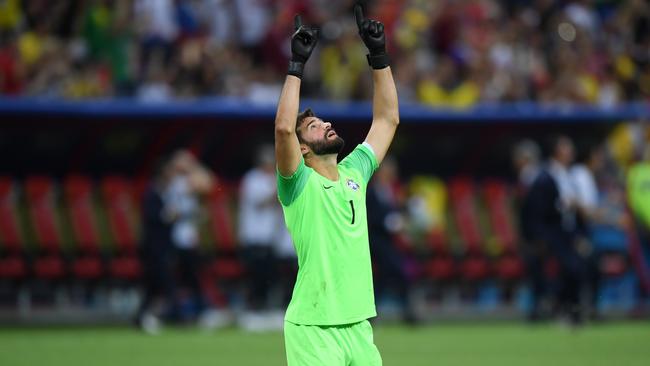 Alisson of Brazil at the final whistle after defeatto Belgium Belgium.