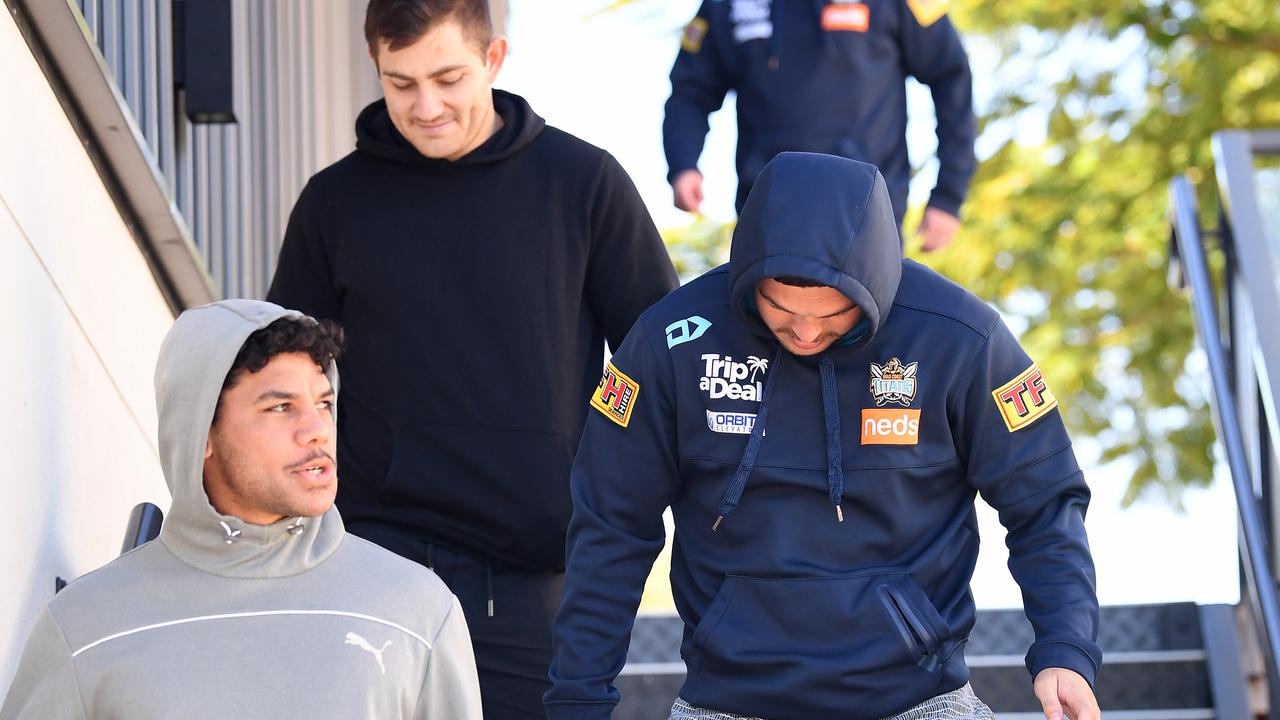 Titans players Brian Kelly, Riley Jacks and Ashley Taylor emerge from a meeting following the axing of coach Garth Brennan.