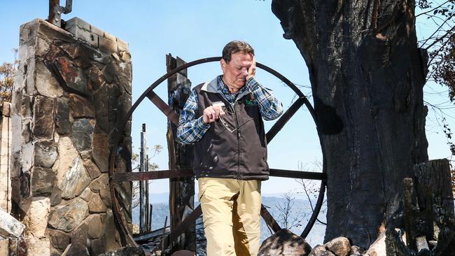 Binna Burra Lodge's Steve Noakes has been left devastated by the destruction of the once picturesque lodge which now lays in ruins. Picture: NIGEL HALLETT