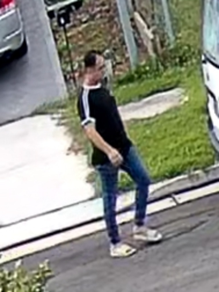 He was seen wearing a black shirt with white panels and dark blue pants. Picture: NSW Police