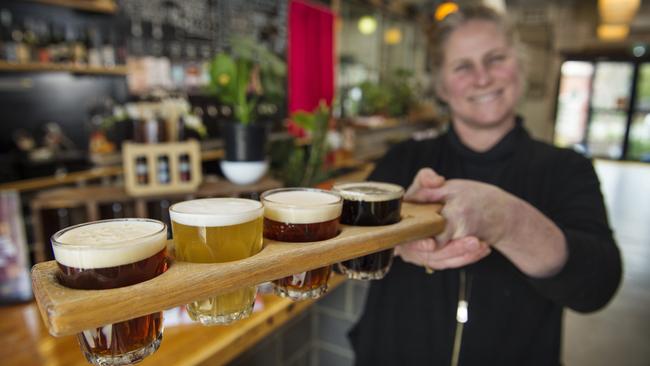 Paddle up: Jacqueline Brodie-Hanns with a sample of the Shedshaker beers. Picture: Zoe Phillips