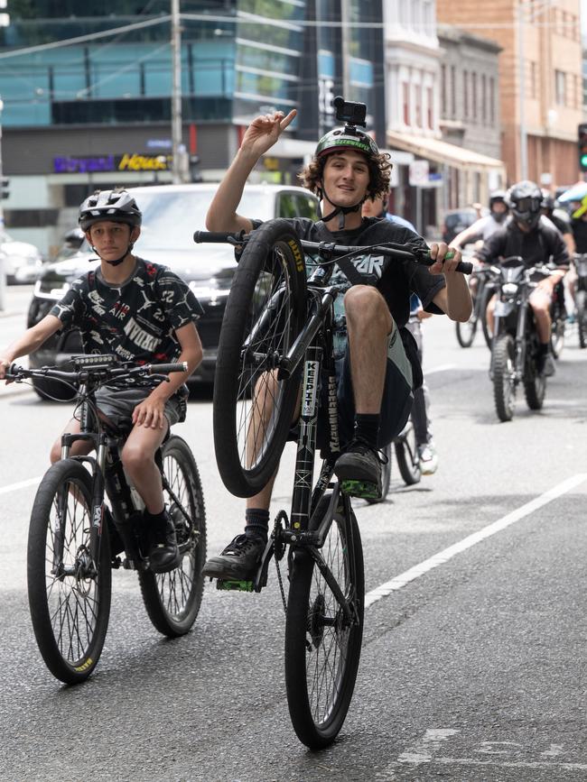 Young riders pop wheelies in the city. Picture: Tony Gough