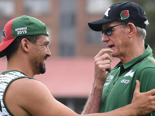 Former Brisbane Bronco's coach Wayne Bennett (right) chats with Cody Walker (left) as he takes up his new coaching position with the South Sydney Rabbitohs during a training session at Redfern Oval in Sydney, Tuesday, December 4, 2018. (AAP Image/Dean Lewins) NO ARCHIVING