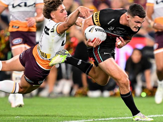 SYDNEY, AUSTRALIA - OCTOBER 01: Nathan Cleary of the Panthers gets past Reece Walsh of the Broncos before scoring a try during the 2023 NRL Grand Final match between Penrith Panthers and Brisbane Broncos at Accor Stadium on October 01, 2023 in Sydney, Australia. (Photo by Bradley Kanaris/Getty Images)