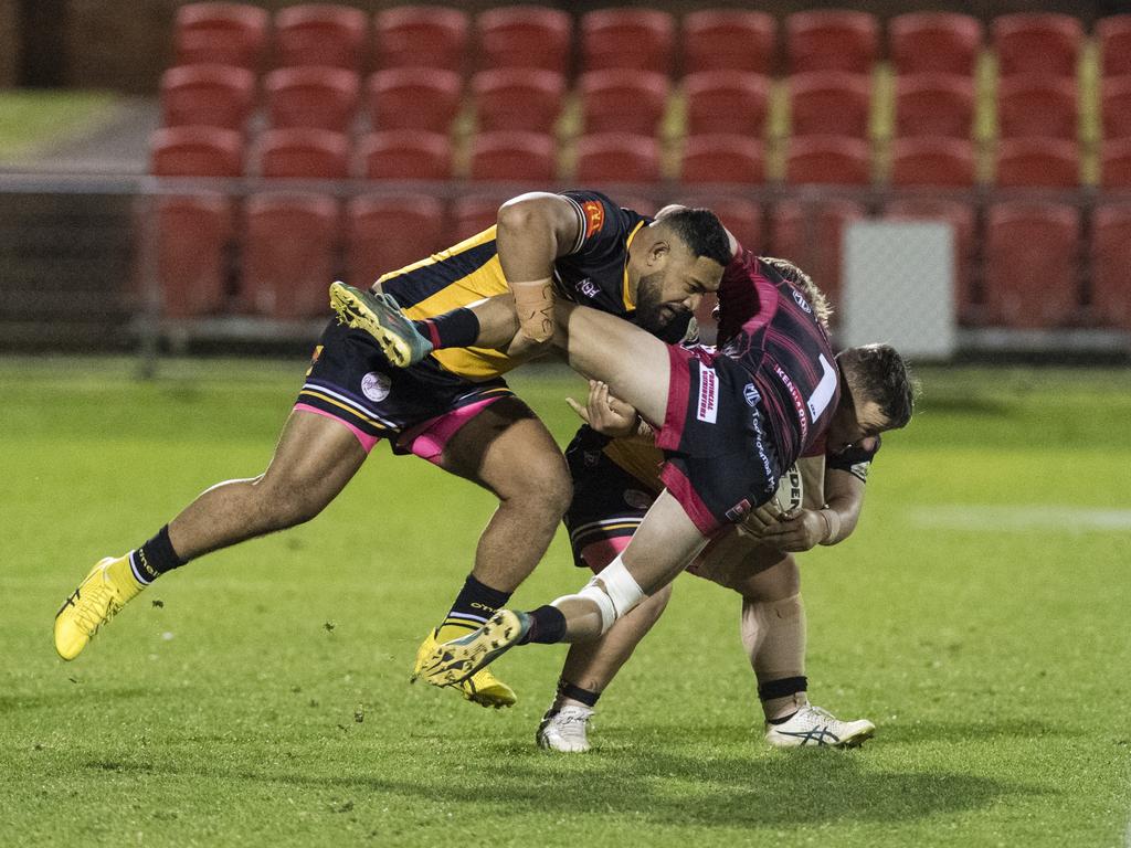 Gatton players Sione Foueti (left) and Regan Wilde tackle Dylan Chown of Valleys. Picture: Kevin Farmer.