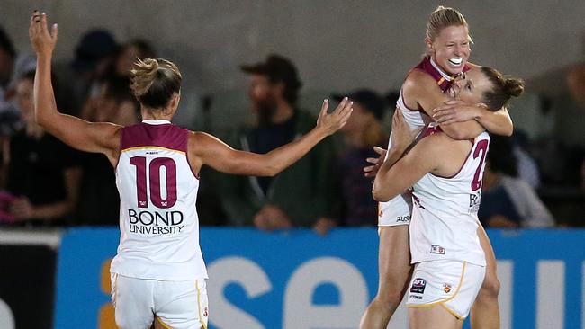Kate McCarthy, Brittany Gibson and Kaitlyn Ashmore celebrate the win. Picture: Michael Klein