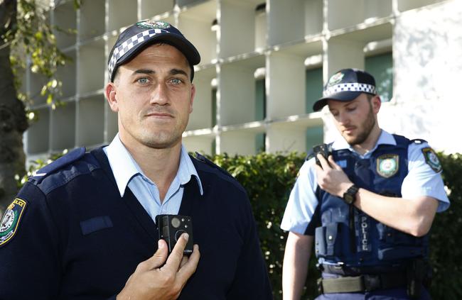 Constable Lindsay Scully and Constable Alex Townend with their new body cameras. Picture: John Appleyard