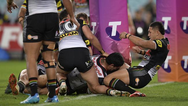 Issac Luke crosses for the Warriors early. (Brett Hemmings/Getty Images)