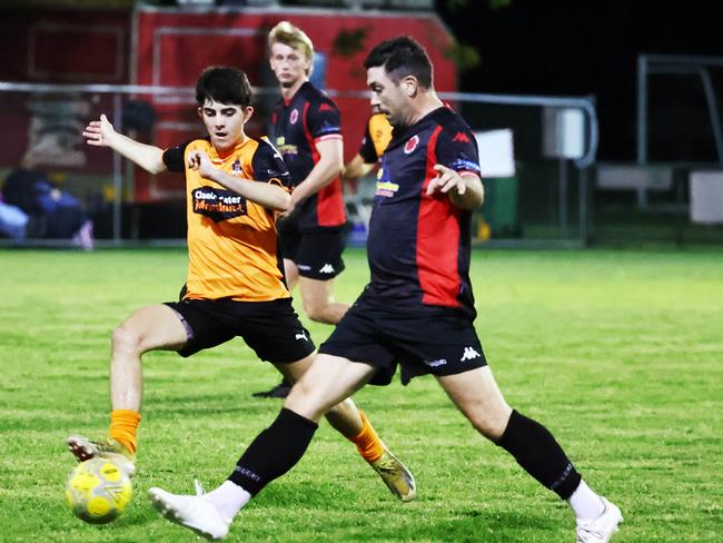 Mareeba's Robert Iacutone and Leichhardt's Bronson Koppen battle for possession in the Football Queensland Premier League Far North (FQPL 3) men's preliminary final match between the Leichhardt Lions and the Mareeba Bulls, held at Endeavour Park, Manunda. Picture: Brendan Radke