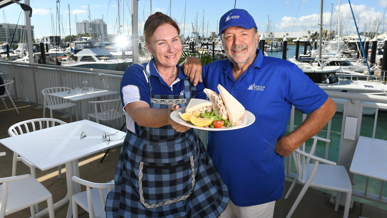 Marina Coffee manager Brydy Stanfield and owner Ron Barker with the cafe’s specialty, The Crab Sandwich. Picture: Shae Beplate.