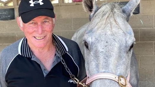 Trainer Jim O'Shea and his mate Barry, known on the racetracks around Queensland as Barachiel. Photo: Tony McMahon