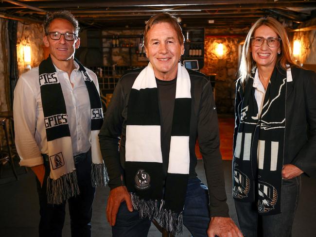 MELBOURNE.  21/11/2021.  Hopeful Collingwood president Jeff Browne with 2 members of his ticket Renee Roberts and Barry Carp in the cellar at the Grace Darling Hotel, where the original meeting to form the Collingwood football club was held in  .    ...  Photo by Michael Klein.