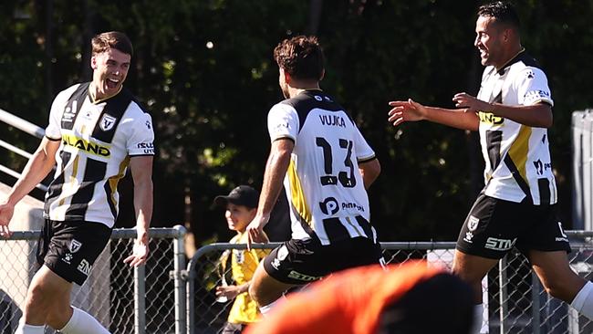 SYDNEY, AUSTRALIA - MARCH 05:  Jake McGing of the Bulls celebrates scoring a goal in added time during the round 19 A-League Men's match between Macarthur FC and Brisbane Roar at Campbelltown Stadium, on March 05, 2023, in Sydney, Australia. (Photo by Mark Kolbe/Getty Images)