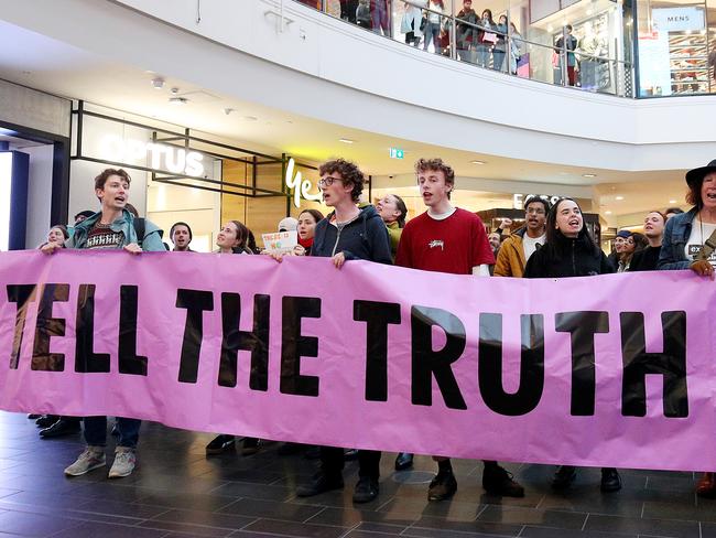 MELBOURNE, AUSTRALIA - SEPTEMBER 06: Protesters raise awareness for climate change at Melbourne Central on September 06, 2019 in Melbourne, Australia. The protest organised by Extinction Rebellion is aimed to raise awareness about climate change with the group pushing for the declaration of a climate emergency.   (Photo by Graham Denholm/Getty Images)