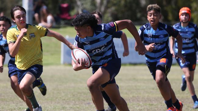 Action galleries of the junior rugby union grand finals, match played at Surfers Paradise Home Ground. Helensvale Hogs Vs Surfers Paradise Dolphins under 13s division. Picture Mike Batterham
