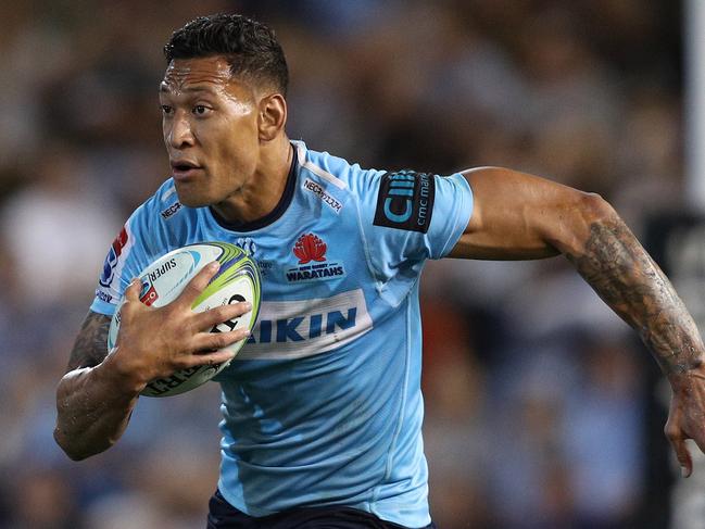 Israel Folau of the Waratahs runs the ball during the Round 7 Super Rugby match between the New South Wales Waratahs and the Sunwolves at McDonald Jones Stadium in Newcastle, Friday, March 29, 2019. (AAP Image/Paul Barkley) NO ARCHIVING, EDITORIAL USE ONLY