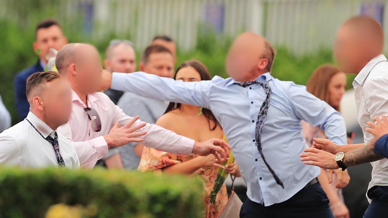 Six men have been charged following a wild brawl at the Rosehill Gardens racecourse on Saturday.