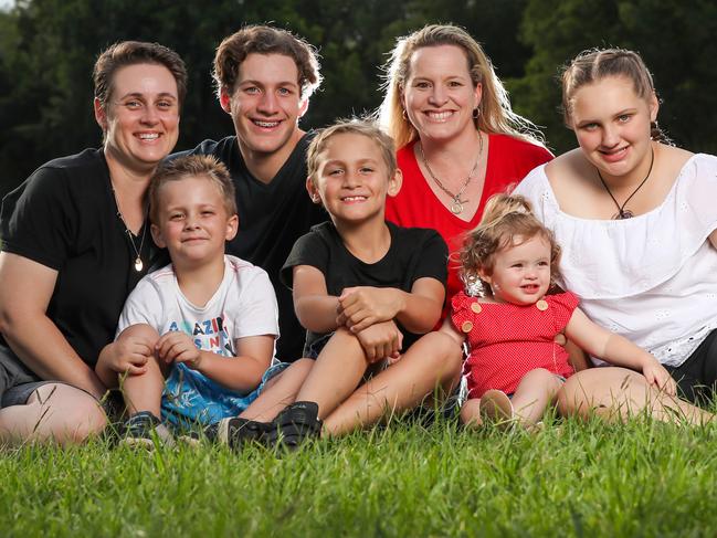 Clockwide from left, Zac, 15, Lisa Quinn, Shannon Ashton, Darcy, 13, Caelan, 4, Delaney, 1,  Mackie, 8, and Caelan, 4. Picture: Nigel Hallett