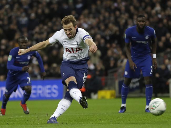 Tottenham's Harry Kane, scores his side first goal on a penalty kick during the English League Cup semifinal first leg soccer match between Tottenham Hotspur and Chelsea at Wembley Stadium in London, Tuesday, Jan. 8, 2019. (AP Photo/Kirsty Wigglesworth)