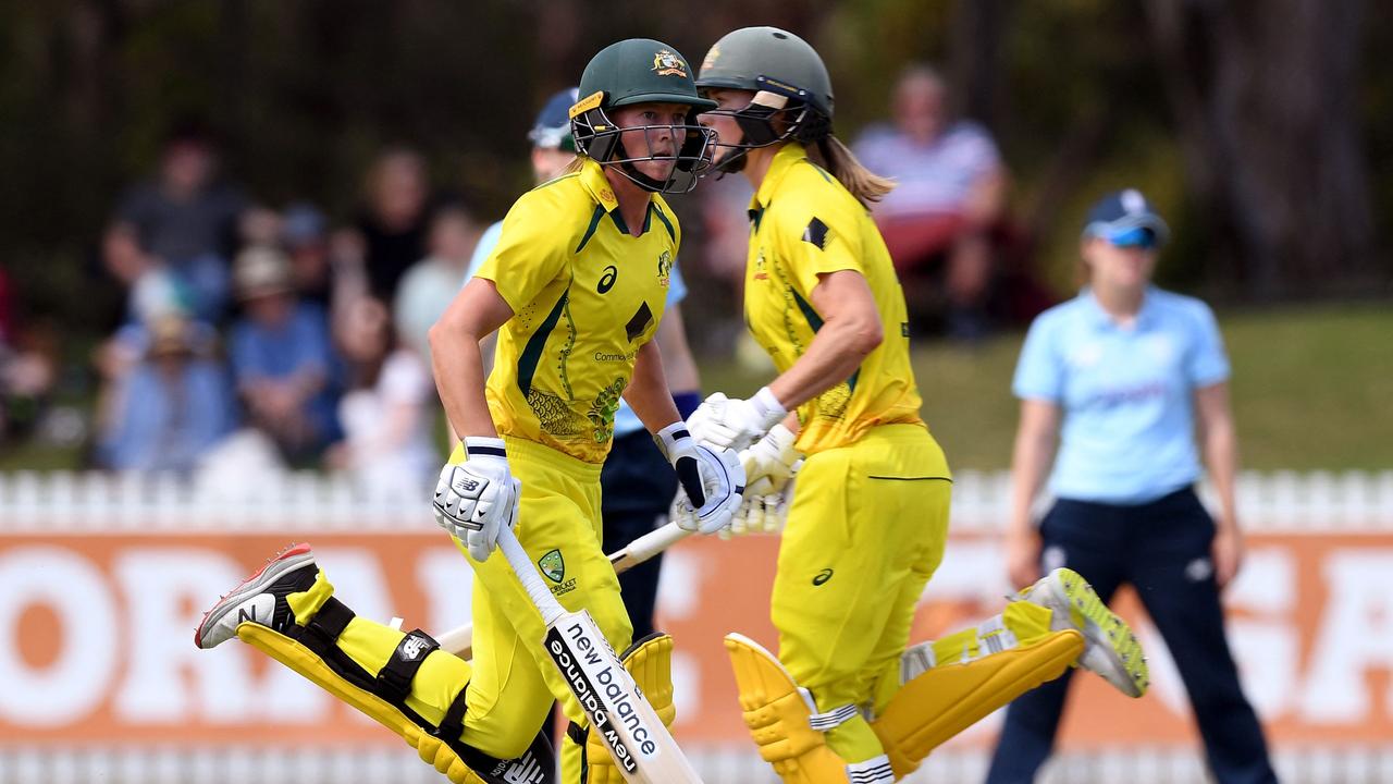 Meg Lanning (L) and Ellyse Perry (R) helped Australia romp to victory over England in Melbourne (Photo by William WEST / AFP)