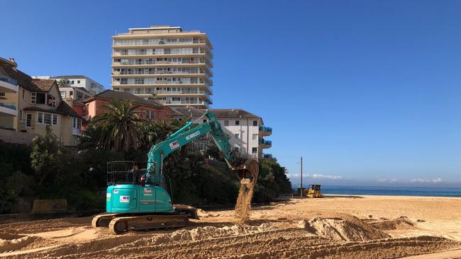 The council was out at Queenscliff Beach preparing Manly Lagoon for the East Coast Low due to hit this weekend. Picture: Julie Cross