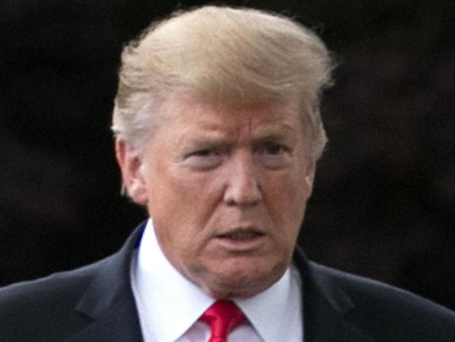 WASHINGTON, DC - MAY 20:    U.S. President Donald Trump talks to journalists as he departs the White House for a campaign rally in Pennsylvania May 20, 2019 in Washington, DC. On his way to Montoursville, Pennsylvania, Trump said that Iran does not currently pose a direct threat to the United States. (Photo by The Asahi Shimbun via Getty Images)