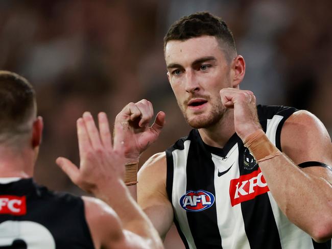 MELBOURNE, AUSTRALIA - MARCH 17: Daniel McStay of the Magpies celebrates a goal during the 2023 AFL Round 01 match between the Geelong Cats and the Collingwood Magpies at the Melbourne Cricket Ground on March 17, 2023 in Melbourne, Australia. (Photo by Dylan Burns/AFL Photos via Getty Images)