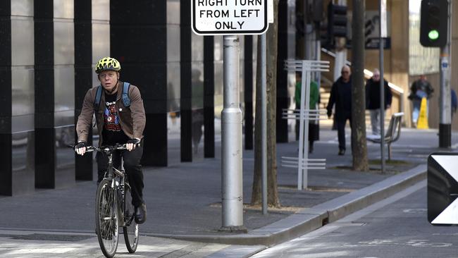 The couple live a “lean” life and save on petrol by riding bikes. Picture: NCA NewsWire / Andrew Henshaw