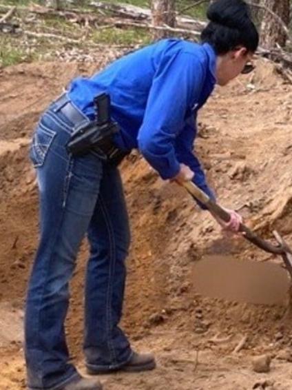 Rural crime investigators at the Putty property where they found Achilles buried. Credit: NSW Police