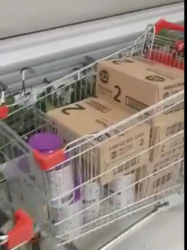 Another shopper began filming the fully loaded trolleys with his mobile phone.