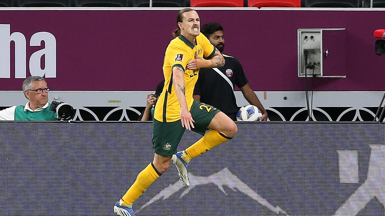 DOHA, QATAR - JUNE 07: Jackson Irvine of Australia celebrates after scoring the first goal of the 2022 FIFA World Cup match between the United Arab Emirates and Australia at the Ahmed Bin Ali Stadium in Doha, Qatar.  (Photo by Mohamed Farag/Getty Images)
