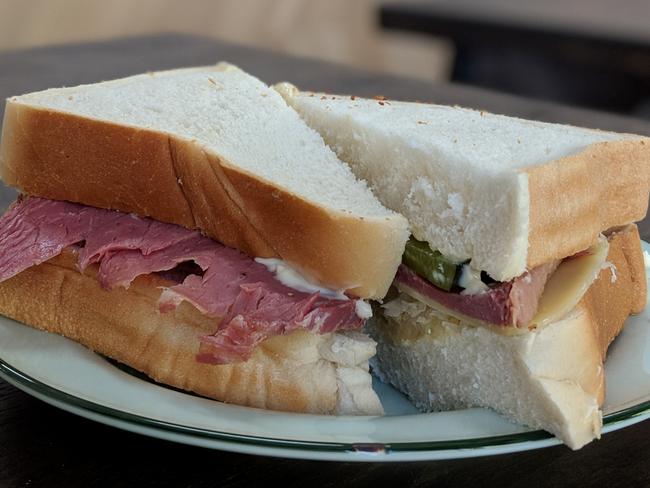 The Reuben sandwich with homemade corn beef, Swiss cheese, pickles, mayo and sauerkraut ($10).