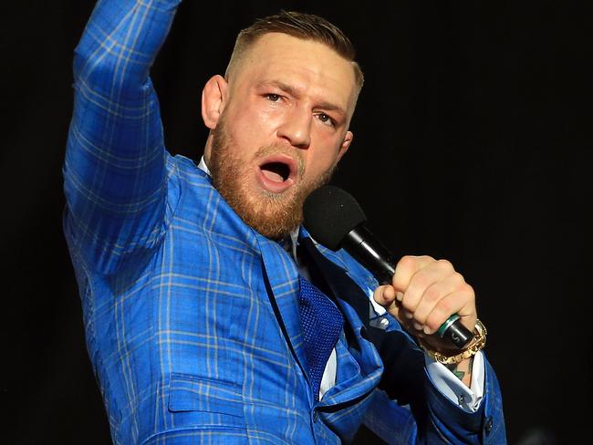 TORONTO, ON - JULY 12:   Conor McGregor speaks during the Floyd Mayweather Jr. v Conor McGregor World Press Tour at Budweiser Stage on July 12, 2017 in Toronto, Canada.  (Photo by Vaughn Ridley/Getty Images)