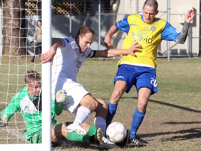 Gold Coast Premier League football.Broadbeach United vs. Surfers Paradise at Nikiforides Family Park.Photo of number 10 attacking the goal.Photo by Richard Gosling