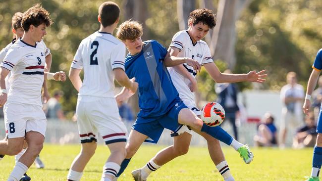 Arden Hogan in action during Saturday’s thriller. GPS First XI football action from a round 8 spectacle between hosts Churchie and visitors TSS.