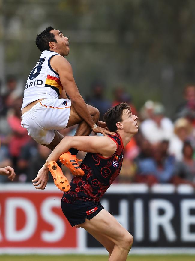 Eddie Betts lifts off over Jake Lever in Alice Springs. Picture: Mark Brake/AAP