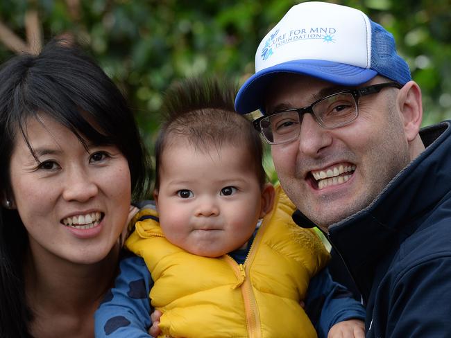 The late Ian Davis in 2015 with wife Mel Yang and son Archie, then nine months old. Picture: David Smith