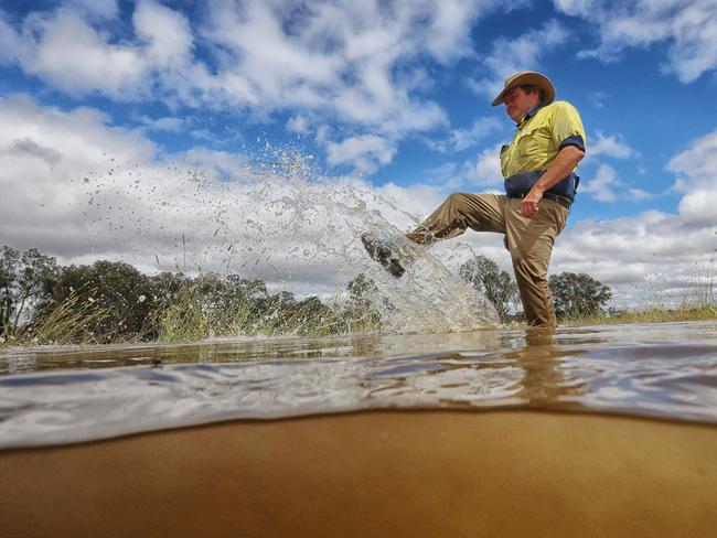 Steve Mooney at his flooded leased farmland in Everton, between Wangaratta and Myrtleford. Picture: Alex Coppel.