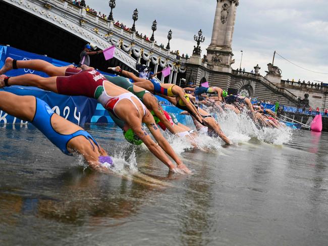 Athletes compete in the women's individual triathlon at the Paris 2024 Olympics.